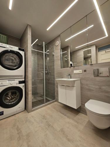 Vonios kambarys apgyvendinimo įstaigoje ANTRI Namai - Apartamentai Birštone