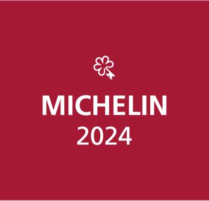 a red box with the words michelin and a flower on it at La Maison du Passage - Chambres, Spa et Restaurant in Martignargues