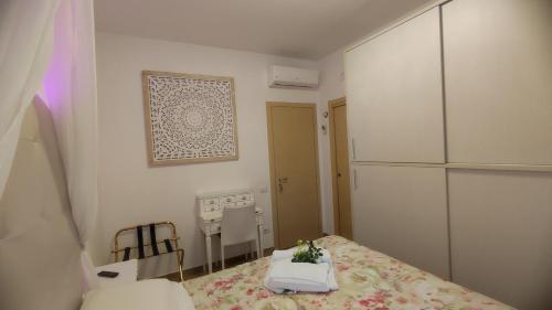 Postel nebo postele na pokoji v ubytování BeB Pignatelli Affittacamere
