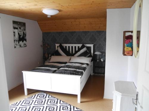 Postel nebo postele na pokoji v ubytování Eva's Home