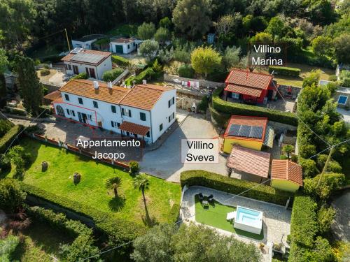 an aerial view of a house with the names at Marina VIP in Marciana