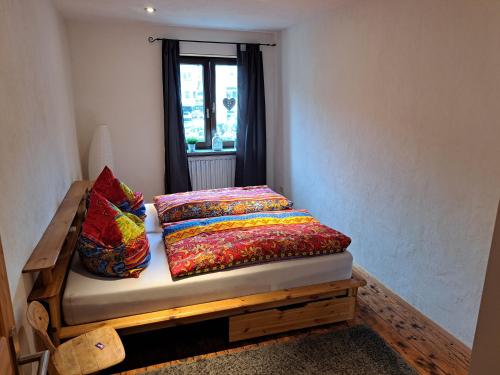a bed with two pillows on it in a room at Zum Jandel in Boppard