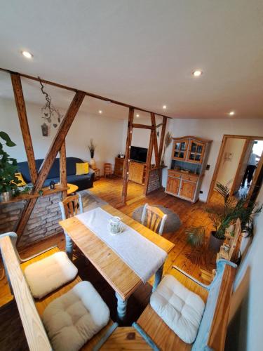 a living room with a table and chairs at Zum Jandel in Boppard