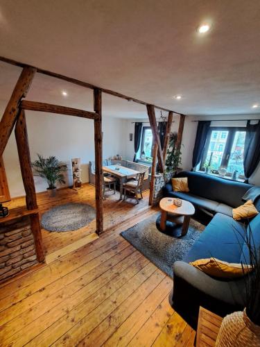 a living room with a couch and a table at Zum Jandel in Boppard