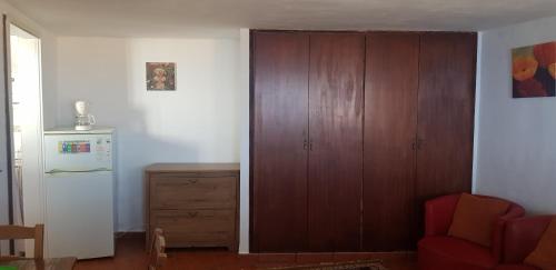 Kuchyň nebo kuchyňský kout v ubytování Estudio acogedor y muy tranquilo, en El Sauzal con fantásticas vistas.