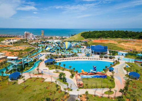 an overhead view of an amusement park with a large pool at Villa Minh Châu in Bình Tú