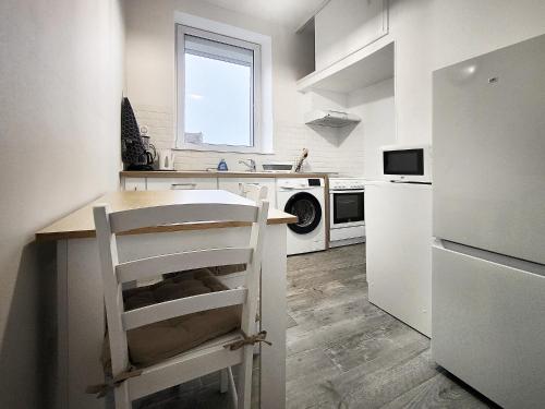 Ett kök eller pentry på Appartement cosy rethel