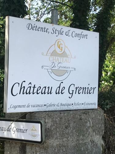 a sign for the chateau de grater at Chateau De Grenier Apartment in Saint-Léger