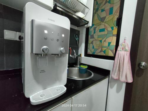 Ένα μπάνιο στο Cikgukay Desaru Homestay Apartment With Pool View WiFi & Netflix