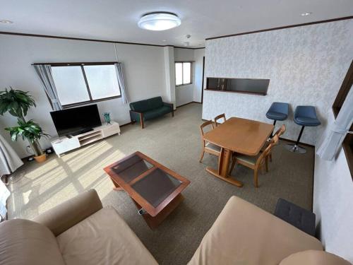 Posezení v ubytování N's Home-南名古屋駅一軒家ルームシェア-4