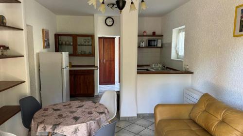 Η κουζίνα ή μικρή κουζίνα στο Apartman Merania