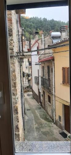 a view of an alley from a window at Casa Ofelia in Colledimezzo
