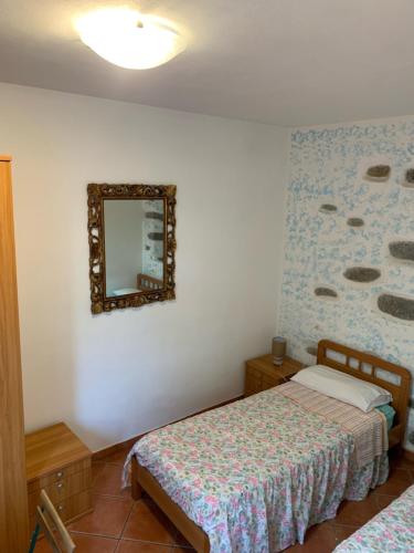 Postel nebo postele na pokoji v ubytování I Limoni 3