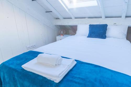 Katil atau katil-katil dalam bilik di Feelcoimbra Castelo Boutique APT - Duplex