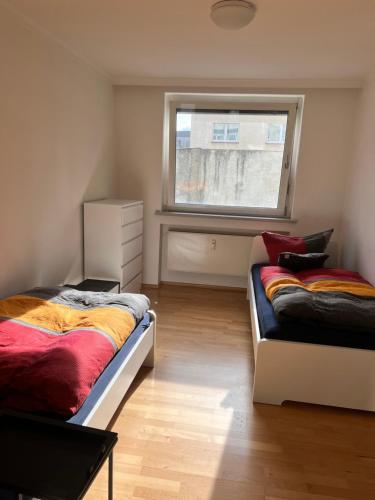 Posteľ alebo postele v izbe v ubytovaní Mainz mit Domblick und 3 Betten