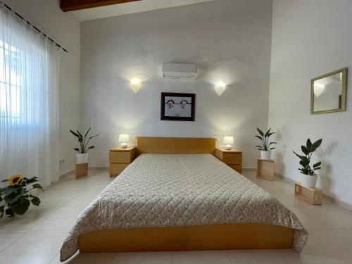 Llit o llits en una habitació de Villa Casa Dalí