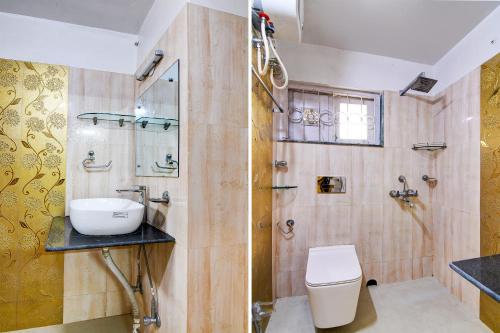 uma casa de banho com um WC, um lavatório e um chuveiro em Hotel Dreamy Sunshine em kolkata