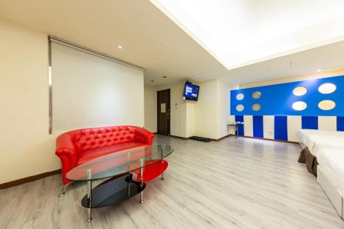 Posezení v ubytování Newrise Hotel
