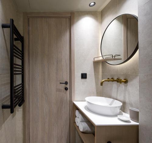 Bilik mandi di Arcadion Hotel