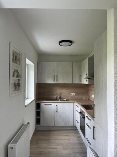 Kuchyň nebo kuchyňský kout v ubytování Apartment Ida