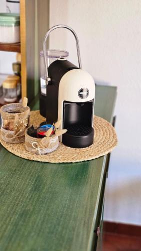 a toaster sitting on top of a kitchen counter at Sardinian Seaside Retreats in Badesi