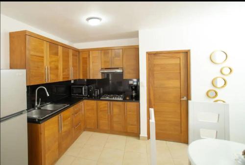 Η κουζίνα ή μικρή κουζίνα στο Cristamar Condominium "Cozy Oasis, Adorable"