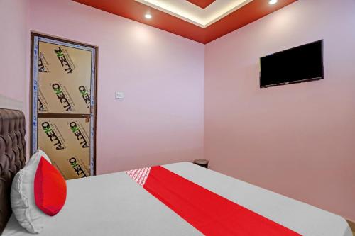 TV a/nebo společenská místnost v ubytování OYO Flagship Avtar Hotel