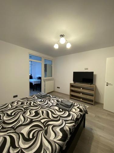 Ένα ή περισσότερα κρεβάτια σε δωμάτιο στο Julian Apartment