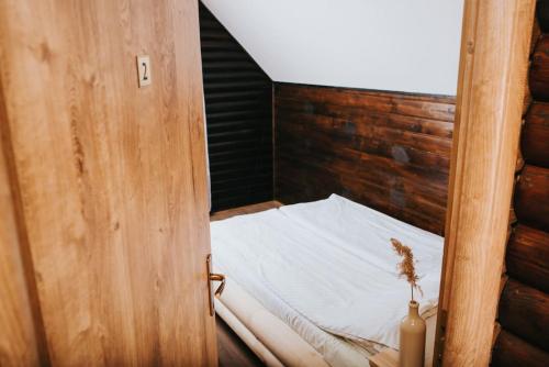 Ένα ή περισσότερα κρεβάτια σε δωμάτιο στο Rustic Wood Villa