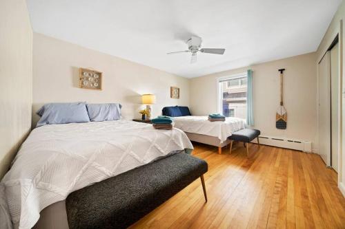 a bedroom with two beds and a window at Seaside Serenity: Charming 2BR Escape - Parking in Scarborough
