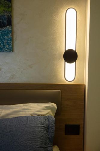 Postel nebo postele na pokoji v ubytování Mustafa Suites