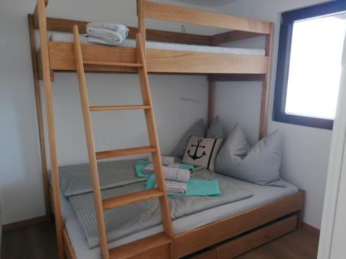 Ένα ή περισσότερα κρεβάτια σε δωμάτιο στο Vortex PBK MobileHome