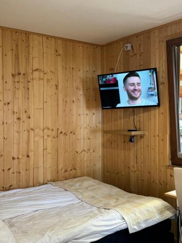 Televisyen dan/atau pusat hiburan di Ośrodek Wczasowy Magdalena