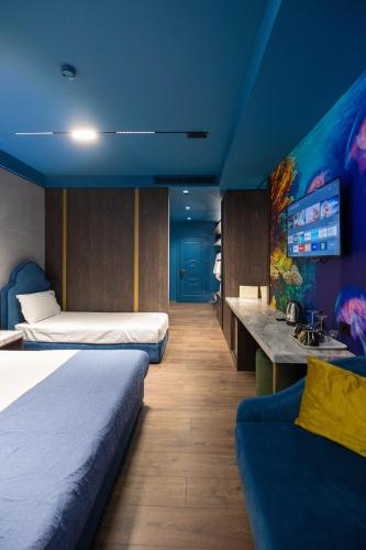 Postel nebo postele na pokoji v ubytování Mustafa Suites