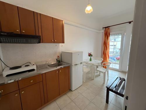 Kuchyň nebo kuchyňský kout v ubytování Chrysa Rooms