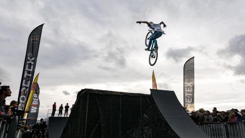 a person doing a trick on a dirt bike in the air at Cosy Studio - Heart of Millau in Millau