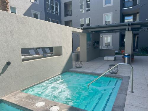 a swimming pool in the side of a building at Ely on Fremont in Las Vegas