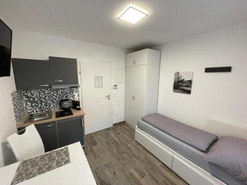 Kuchyň nebo kuchyňský kout v ubytování Nici´s Appartements