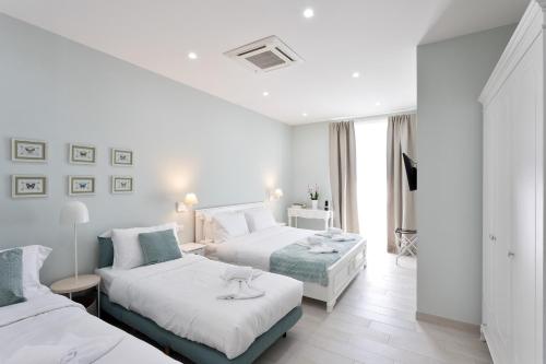 Кровать или кровати в номере Colosseo House