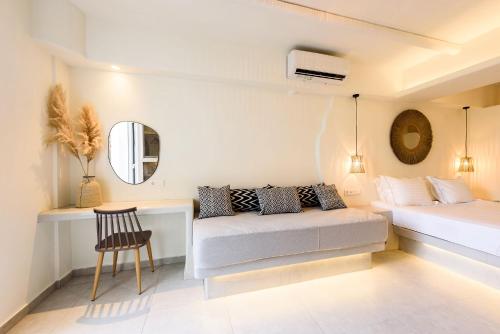 Letto o letti in una camera di Vammos Luxury Residences