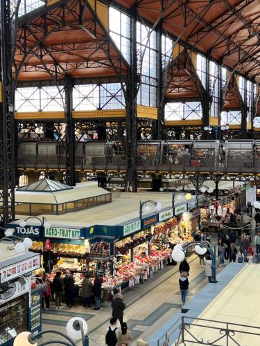 a view of a market with people walking around it at Cedar Inn Budapest - Palace District in Budapest