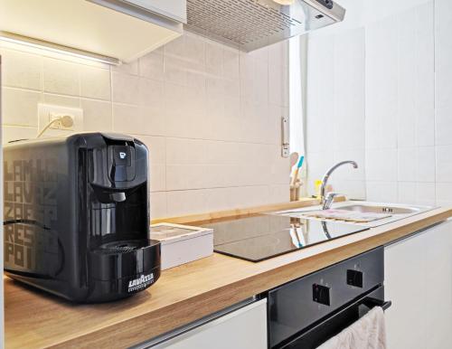 Dapur atau dapur kecil di Old City Apartment