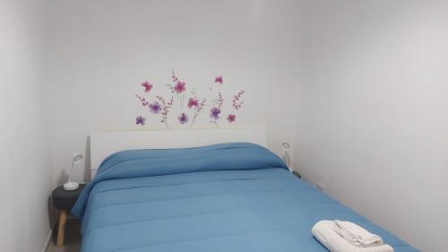 Postel nebo postele na pokoji v ubytování Casa Neve al mare