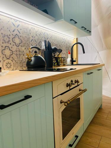 Kuchyň nebo kuchyňský kout v ubytování IdyllaGlamp- Glamping Boho