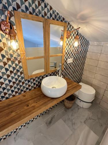 a bathroom with a sink and a toilet at Paradise View - Lauro Golf in Alhaurín de la Torre