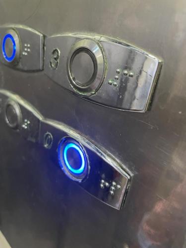 a close up of a cell phone with blue lights at Hotel Costa Linda Beach Boca Chica in Boca Chica