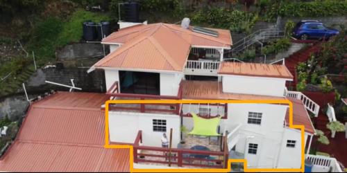 an aerial view of a house with a roof at Story Villa 2 Bedrooms with Mountain & Ocean View in Canaries