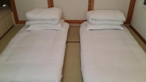 Cama o camas de una habitación en The Coast