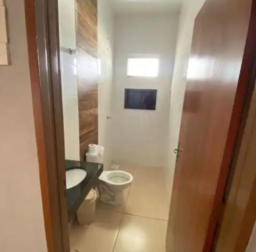 Ένα μπάνιο στο Casa de temporada