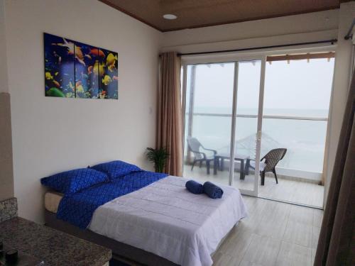 Postel nebo postele na pokoji v ubytování Sueños en la playa